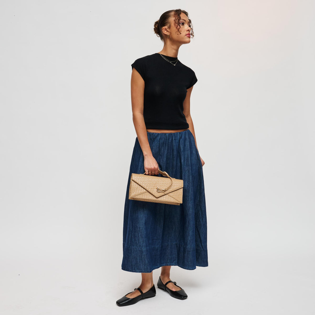 Woman wearing Natural Urban Expressions Khaleesi Clutch 840504211904 View 3 | Natural