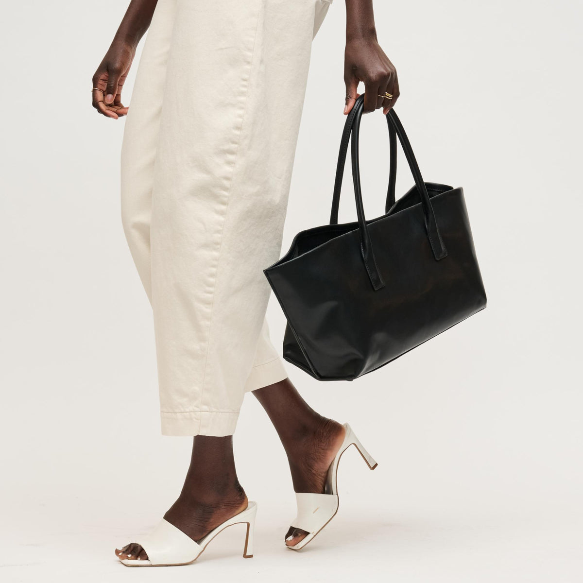 Woman wearing Black Urban Expressions Levi Tote 840504205255 View 4 | Black