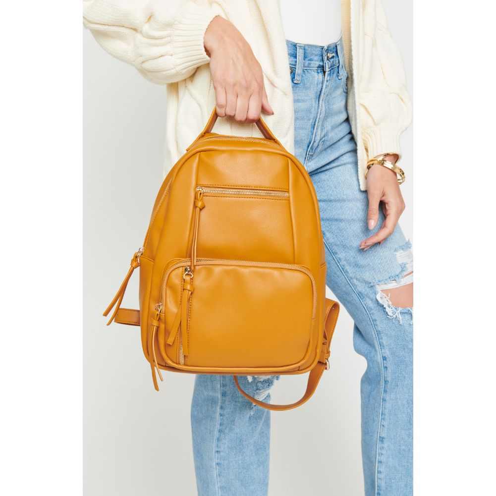 Woman wearing Mustard Urban Expressions Preston Backpack 840611175267 View 3 | Mustard