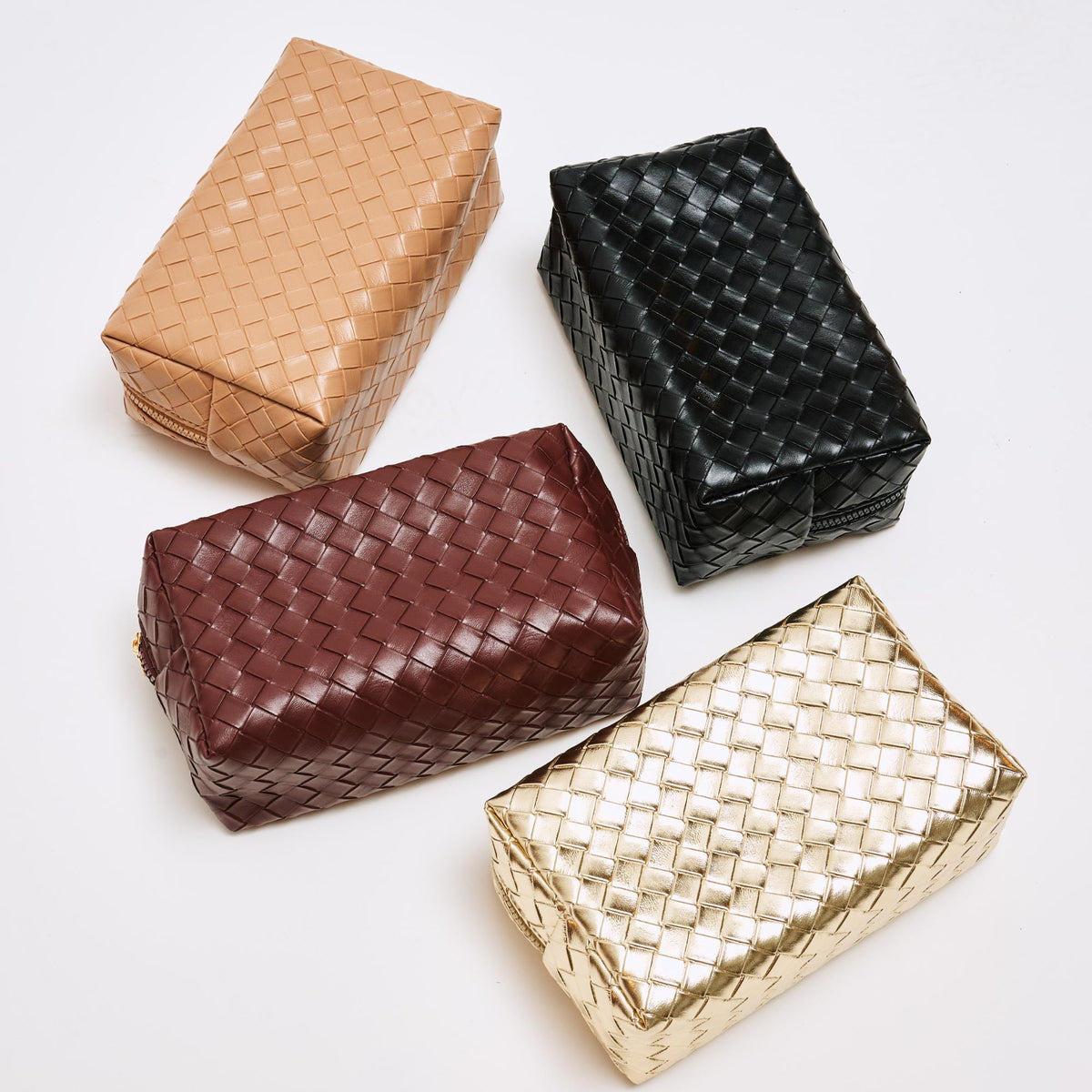 Woman wearing Chocolate Urban Essentials Weave & Wander Cosmetic & Travel Organizer Pouch 840611197863 View 2 | Chocolate