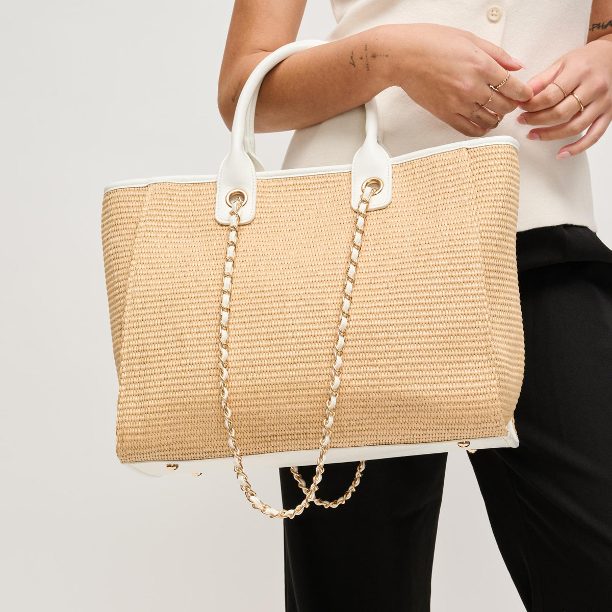 Woman wearing Natural White Urban Expressions Jaxon Tote 840504205033 View 1 | Natural White