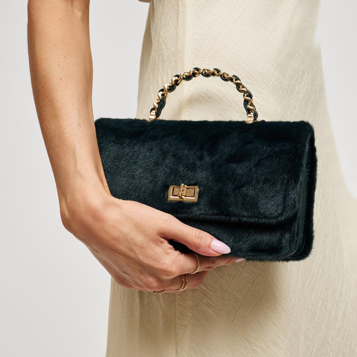 Woman wearing Emerald Urban Expressions Lulu - Fur Crossbody 840504212413 View 1 | Emerald