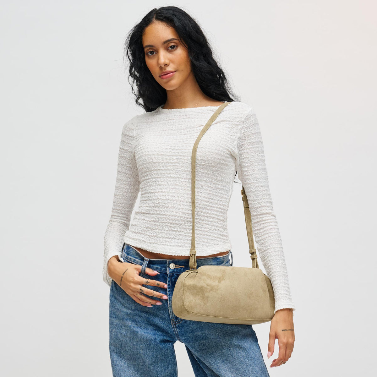 Woman wearing Sage Urban Expressions Lizzie Crossbody 840611199072 View 3 | Sage
