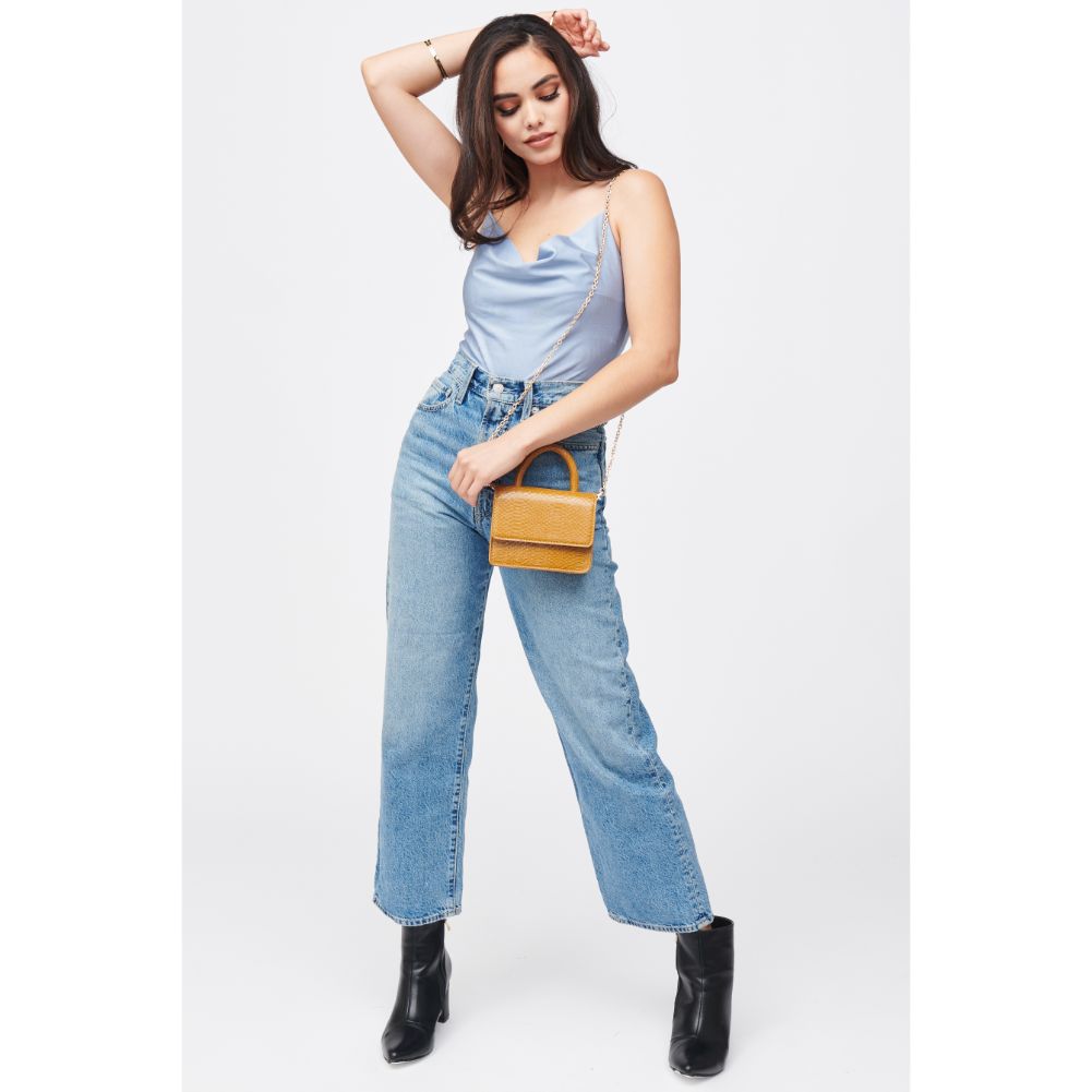 Woman wearing Mustard Urban Expressions Faye Top Handle 840611184788 View 4 | Mustard