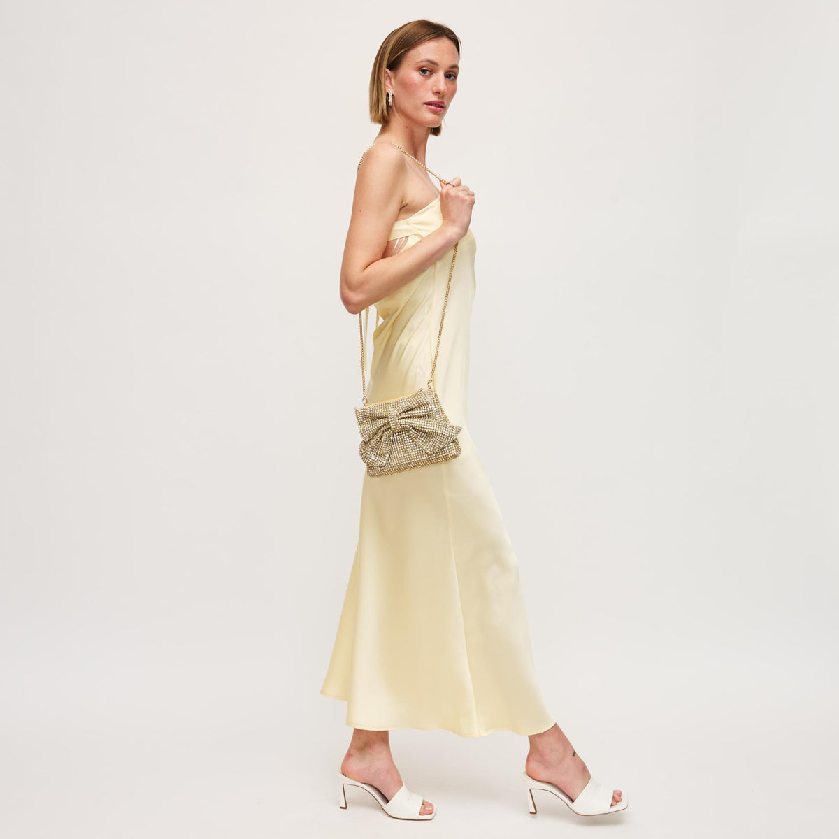 Woman wearing Gold Urban Expressions Gretchen Evening Bag 840611156372 View 2 | Gold