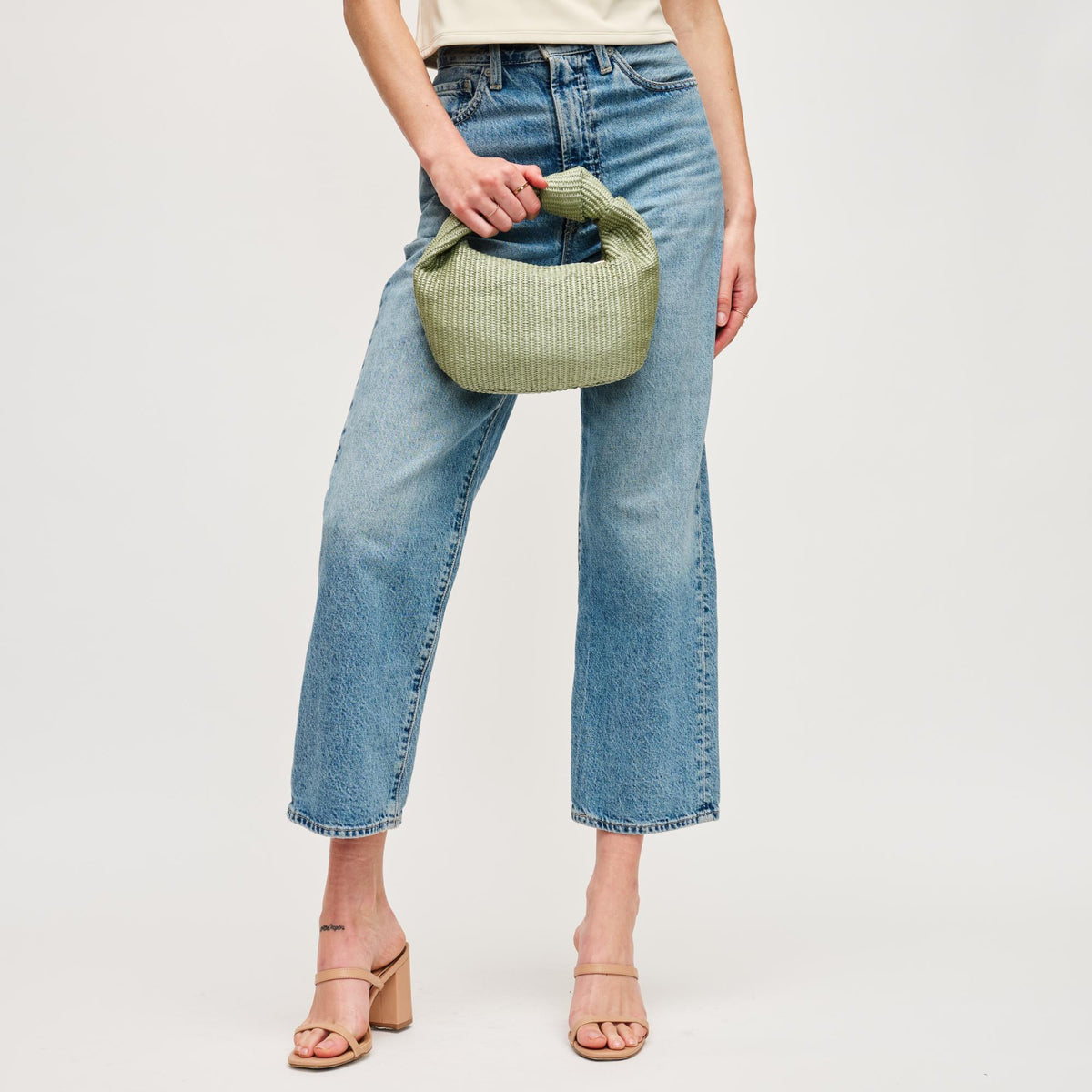 Woman wearing Sage Urban Expressions Tracy - Stripes Clutch 840611141682 View 4 | Sage