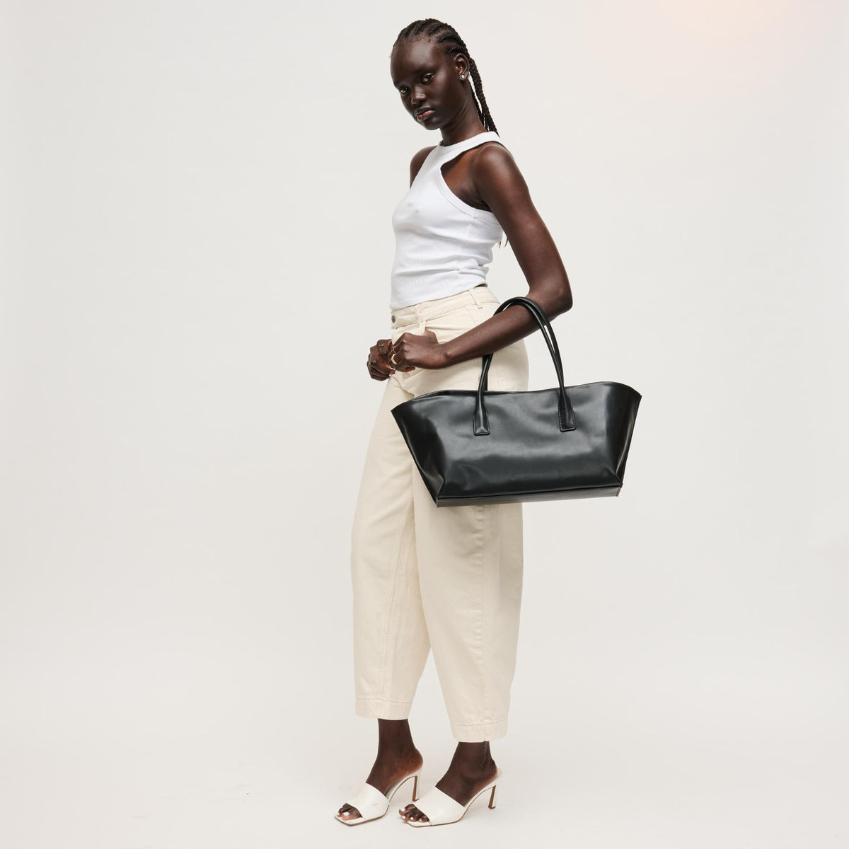 Woman wearing Black Urban Expressions Levi Tote 840504205255 View 3 | Black