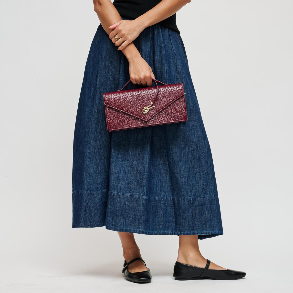 Woman wearing Burgundy Urban Expressions Khaleesi Clutch 840504211881 View 2 | Burgundy
