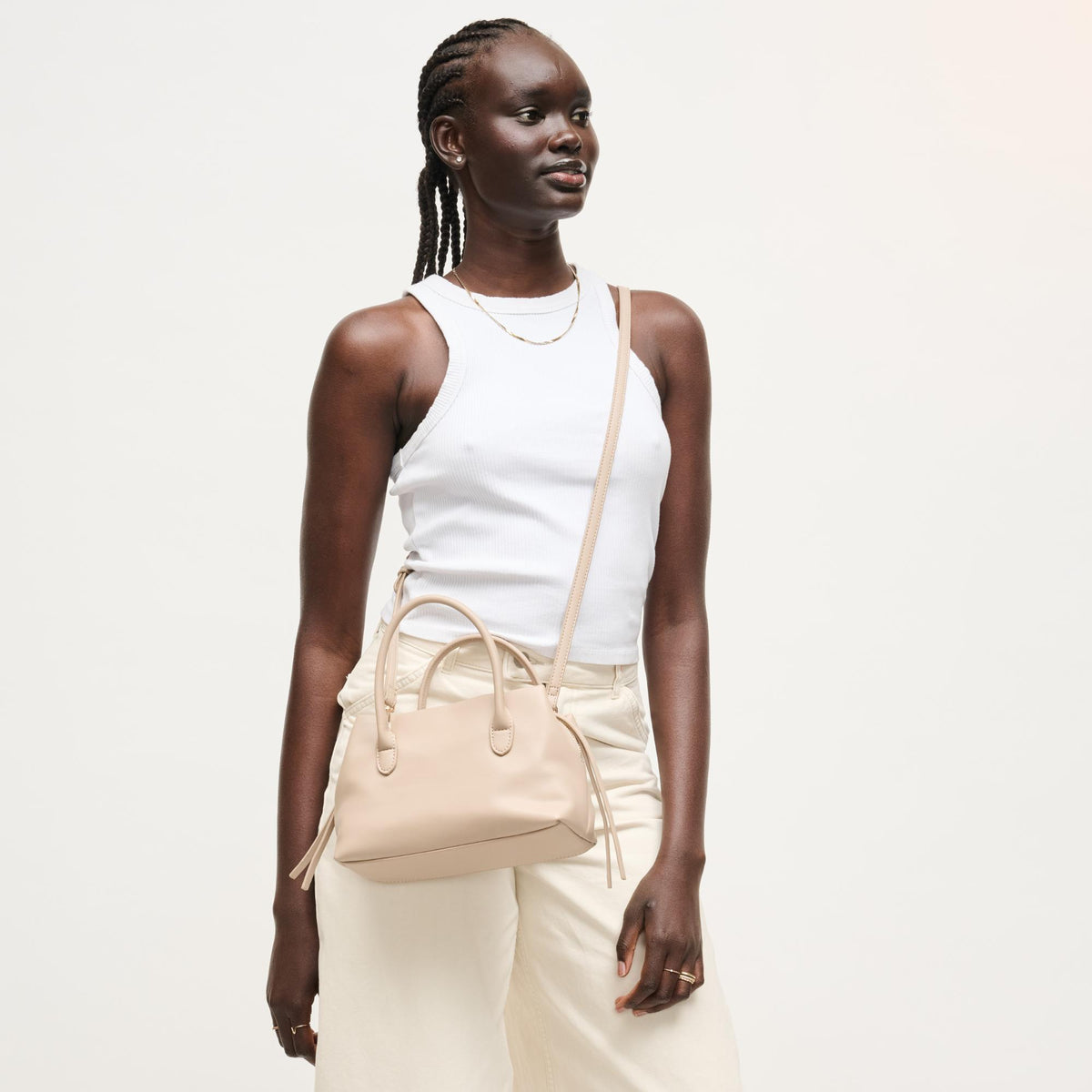 Woman wearing Stone Urban Expressions Logan Crossbody 840504205378 View 3 | Stone