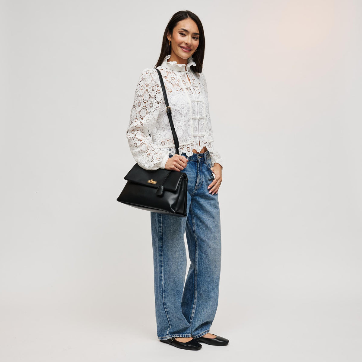 Woman wearing Black Urban Expressions Arrow Satchel 840504212925 View 4 | Black