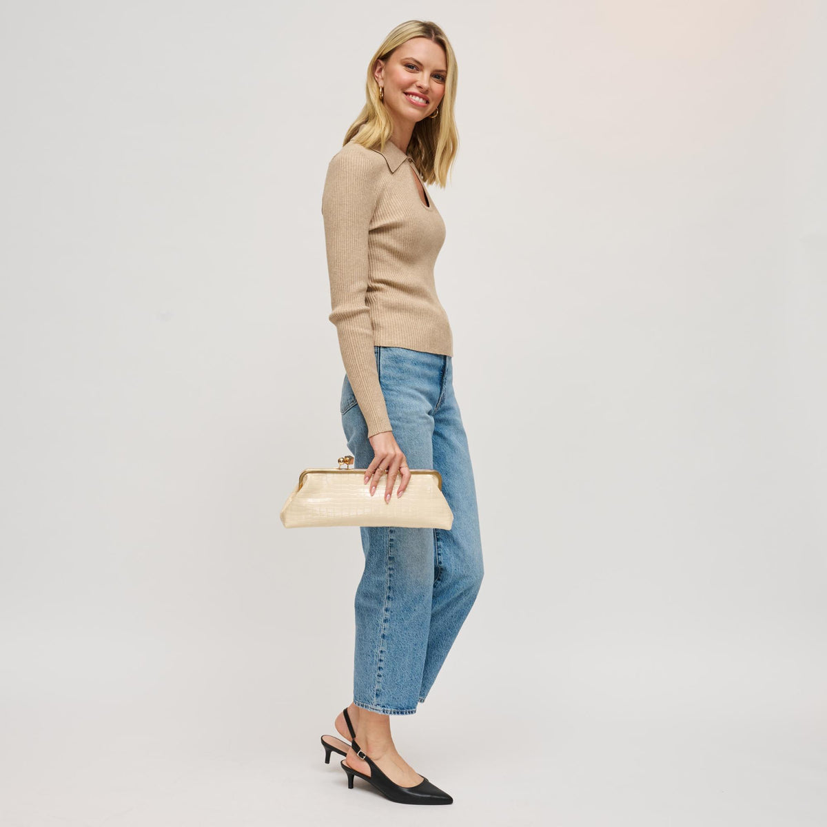 Woman wearing Cream Urban Expressions Piper Clutch 840504200755 View 2 | Cream