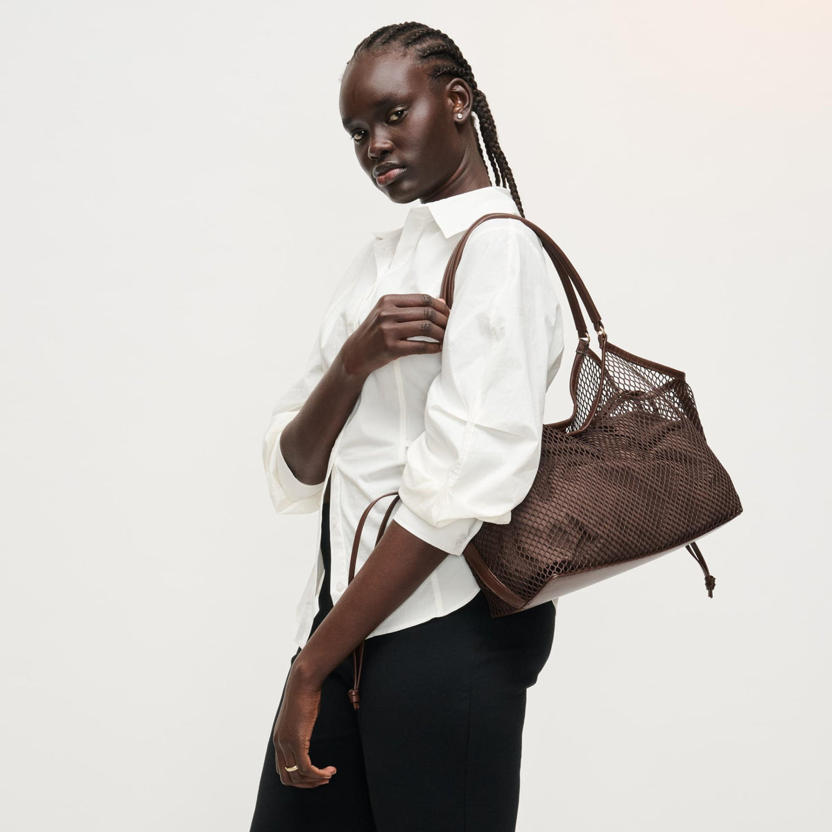 Woman wearing Chocolate Urban Expressions Easton Tote 840504205200 View 2 | Chocolate