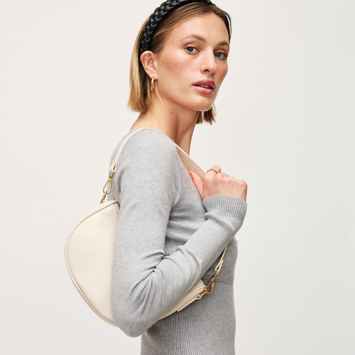 Woman wearing Oatmilk Urban Expressions Mila Crossbody 840611154309 View 2 | Oatmilk