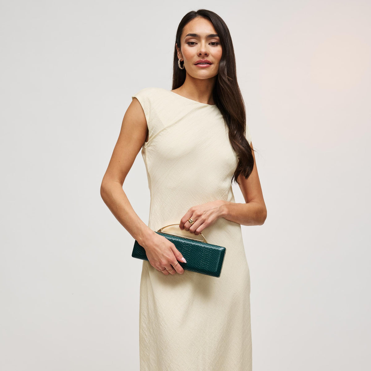 Woman wearing Emerald Urban Expressions Banks Clutch 840504212093 View 2 | Emerald