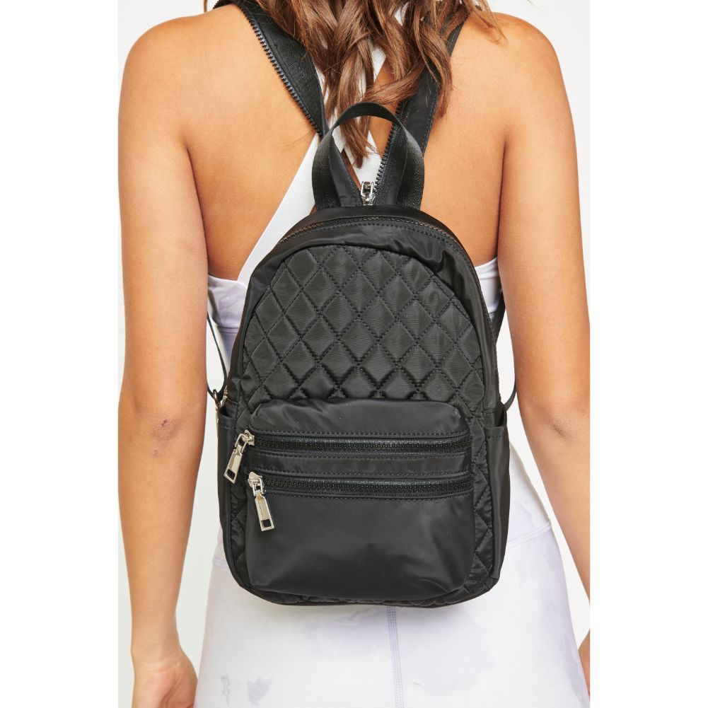 Woman wearing Black Urban Expressions Brynlee Sling Backpack 840611180452 View 1 | Black