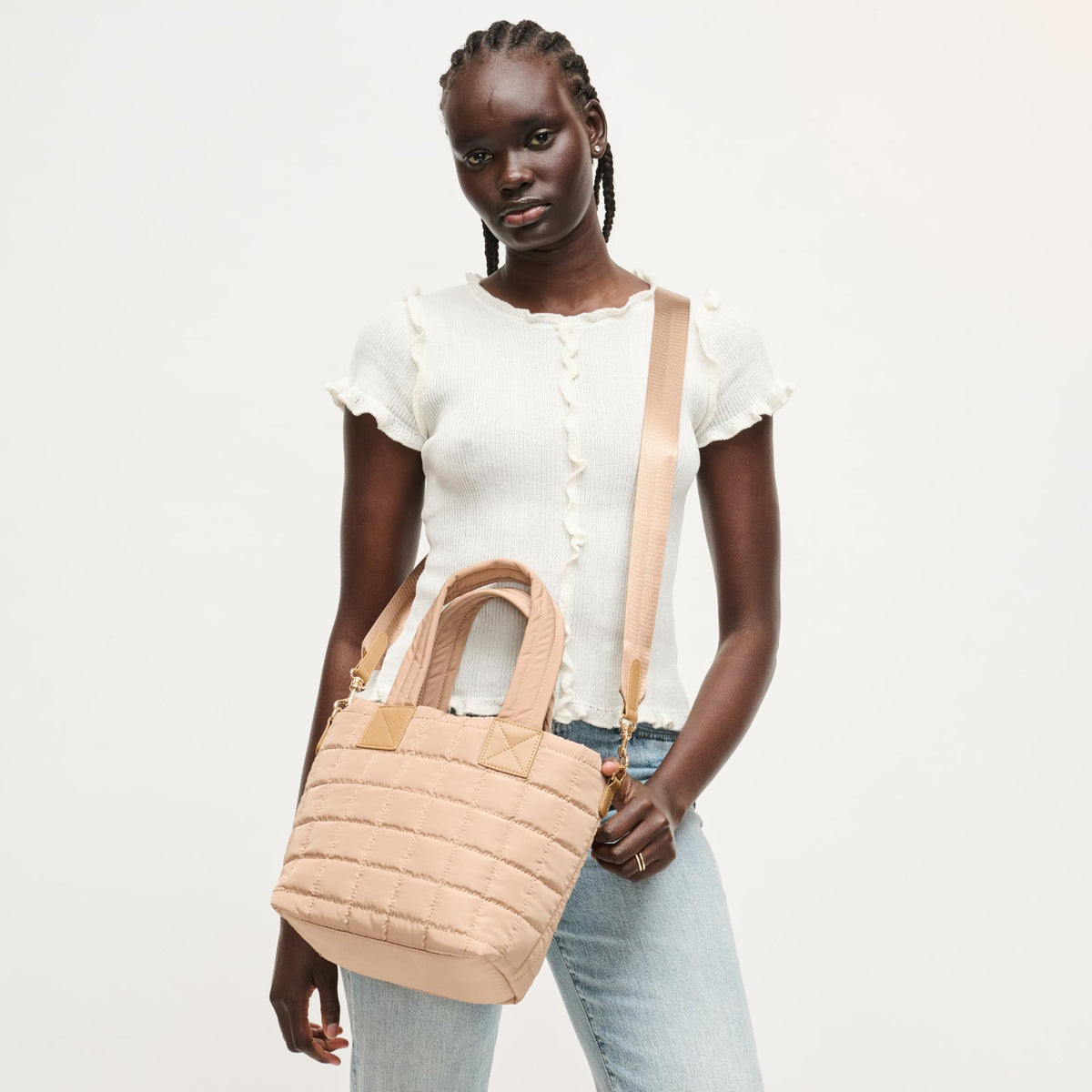 Woman wearing Natural Urban Expressions Lumina Tote 840504205972 View 1 | Natural