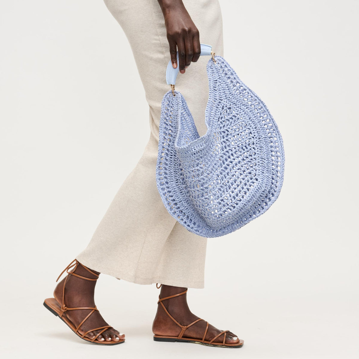 Woman wearing Periwinkle Urban Expressions Camden Hobo 840504208942 View 1 | Periwinkle