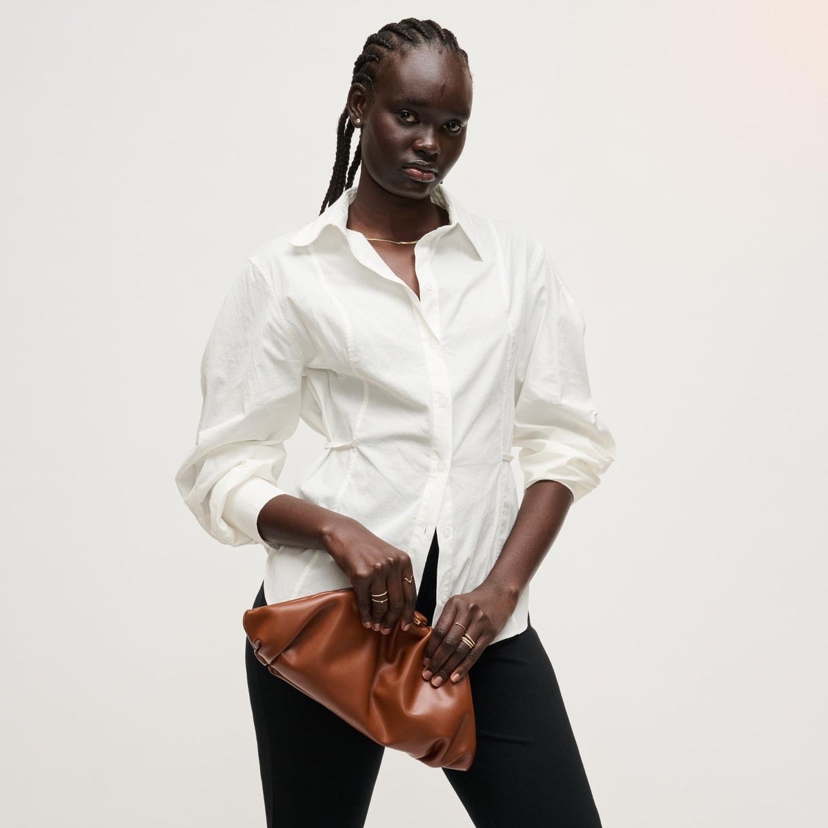 Woman wearing Chocolate Urban Expressions Jennifer Clutch 840504208249 View 4 | Chocolate