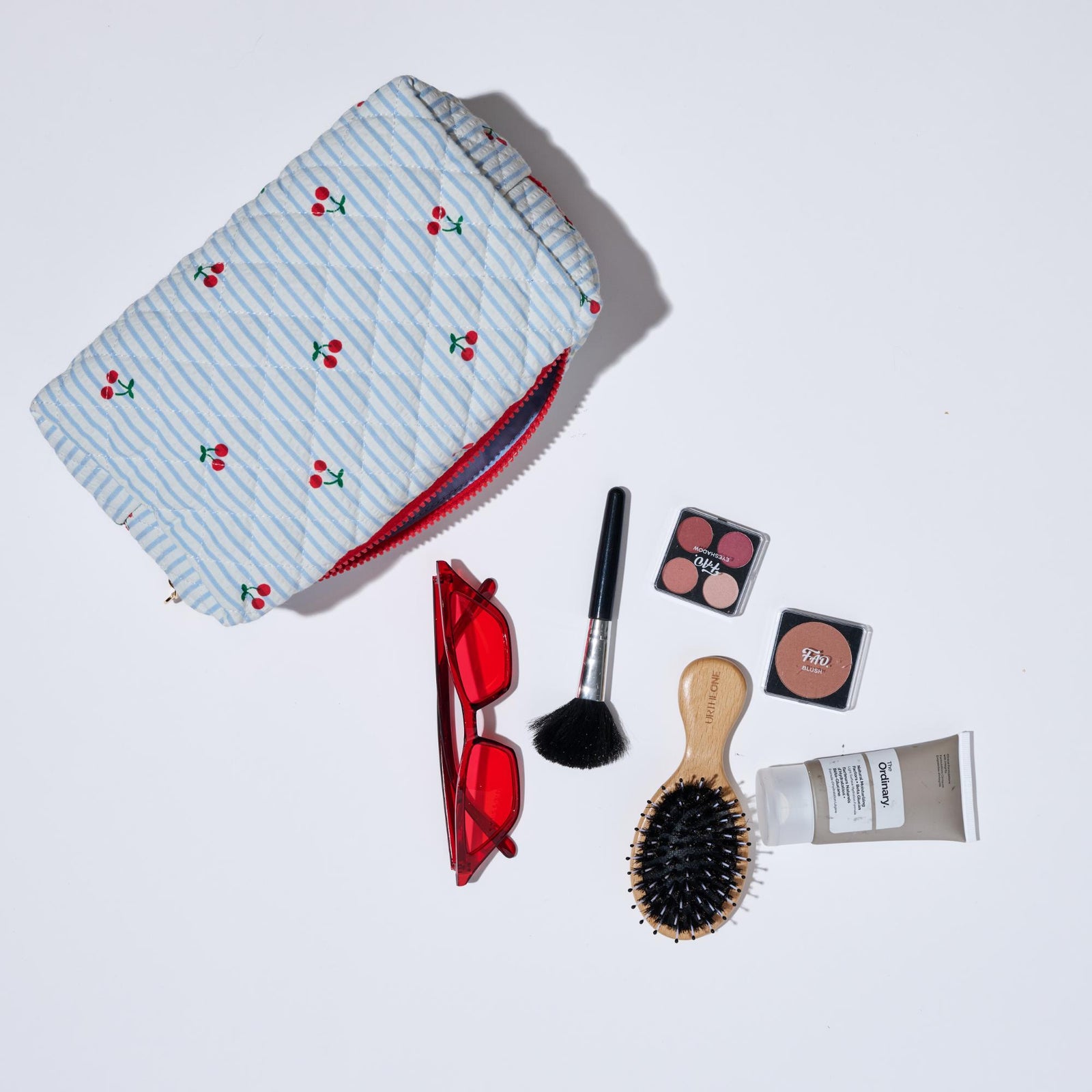 Woman wearing Blue Cherry Urban Essentials Cherry Lane Cosmetic & Travel Organizer Pouch 840611196941 View 1 | Blue Cherry