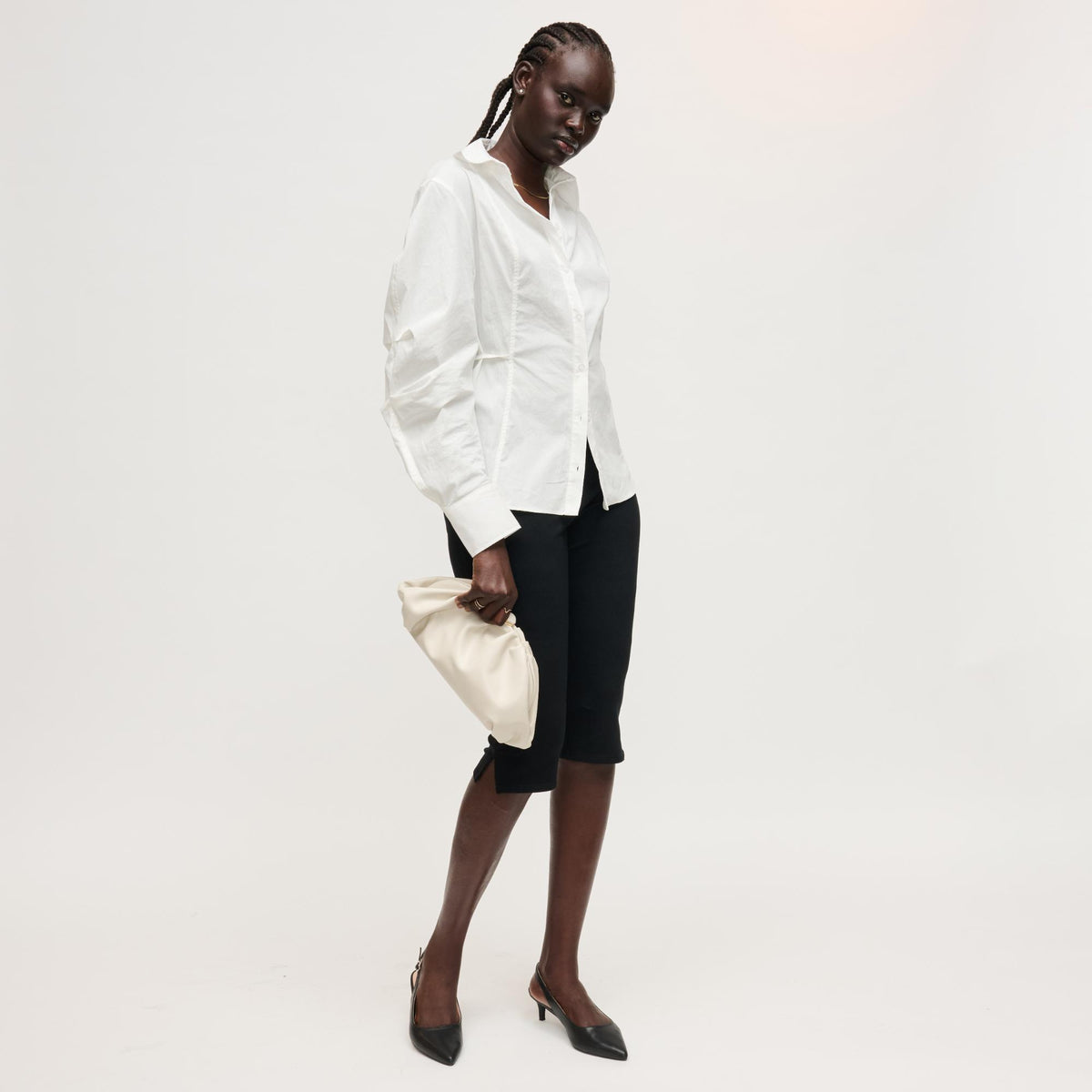 Woman wearing Ivory Urban Expressions Jennifer Clutch 840504208225 View 4 | Ivory