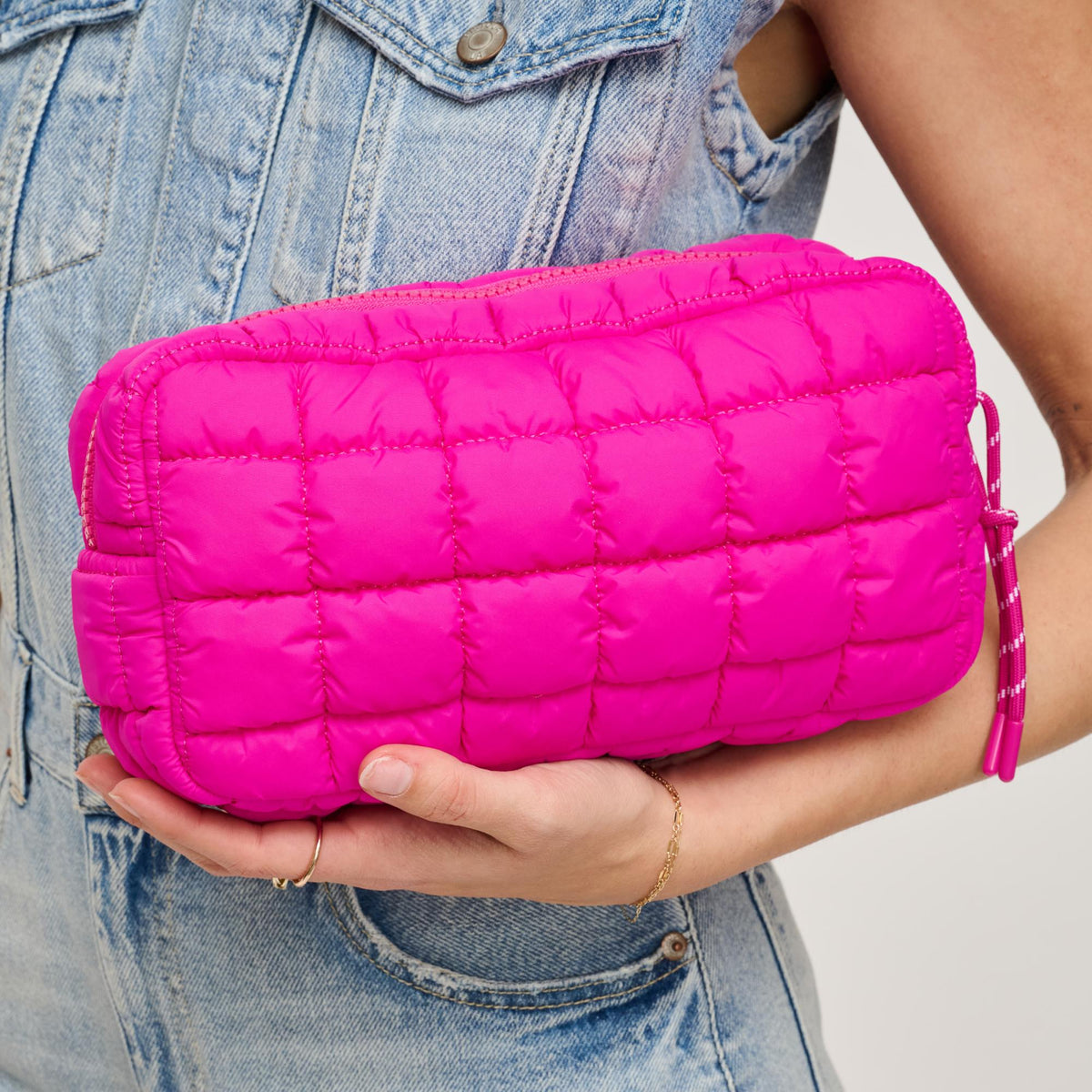 Woman wearing Fuchsia Urban Essentials Cloud Nine - Puffer Cosmetic & Travel Organizer Pouch 840611143778 View 2 | Fuchsia