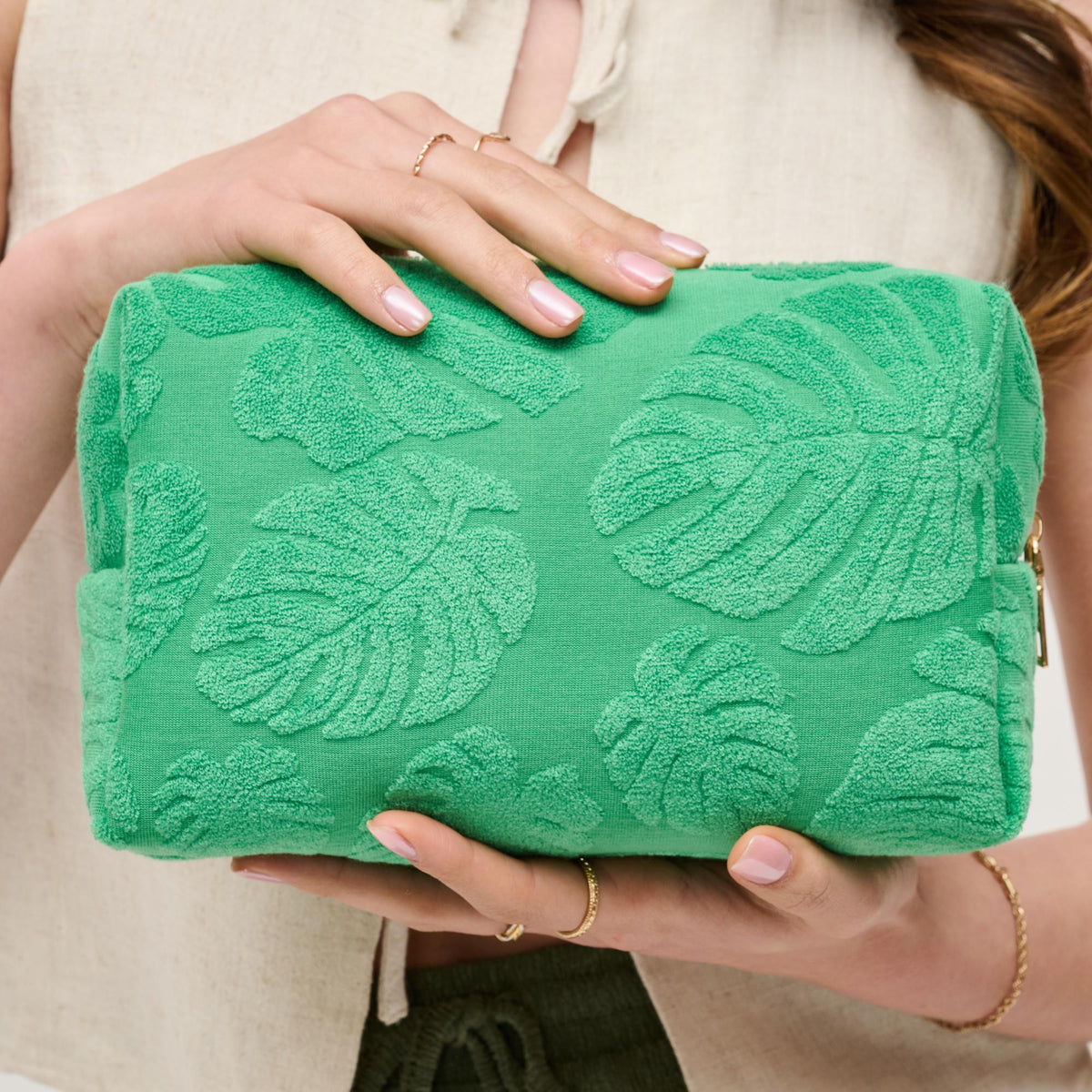 Woman wearing Green Urban Essentials Palm Breeze Cosmetic & Travel Organizer Pouch 840611195340 View 3 | Green
