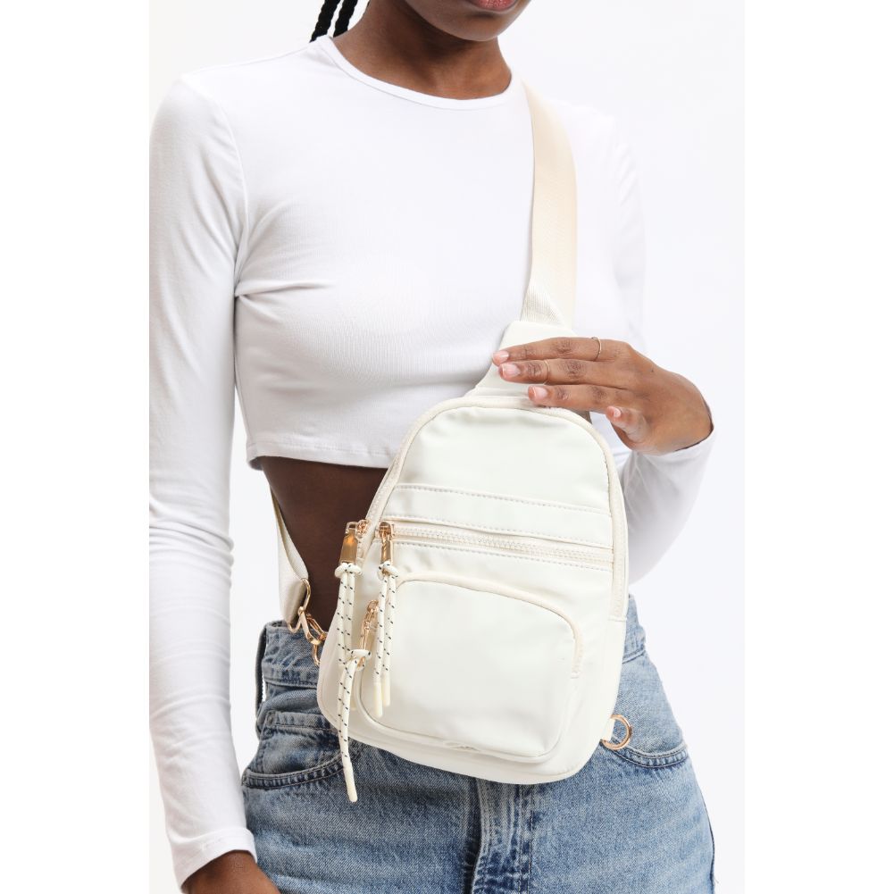 Woman wearing Black Urban Expressions Sid Sling Backpack 840611120663 View 1 | Black
