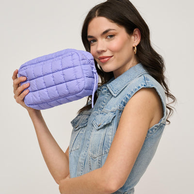 Woman wearing Periwinkle Urban Expressions Cloud Nine - Quilted Puffer Nylon Cosmetic Pouch 840611143785 View 1 | Periwinkle