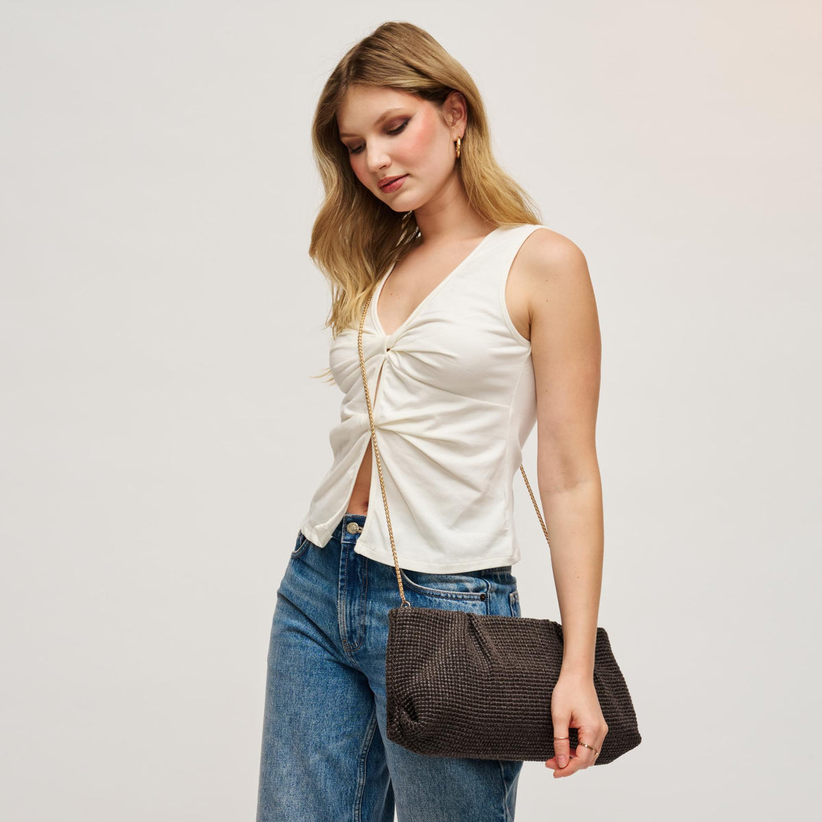 Woman wearing Chocolate Urban Expressions Franny - Seasonal Clutch 840504208522 View 3 | Chocolate