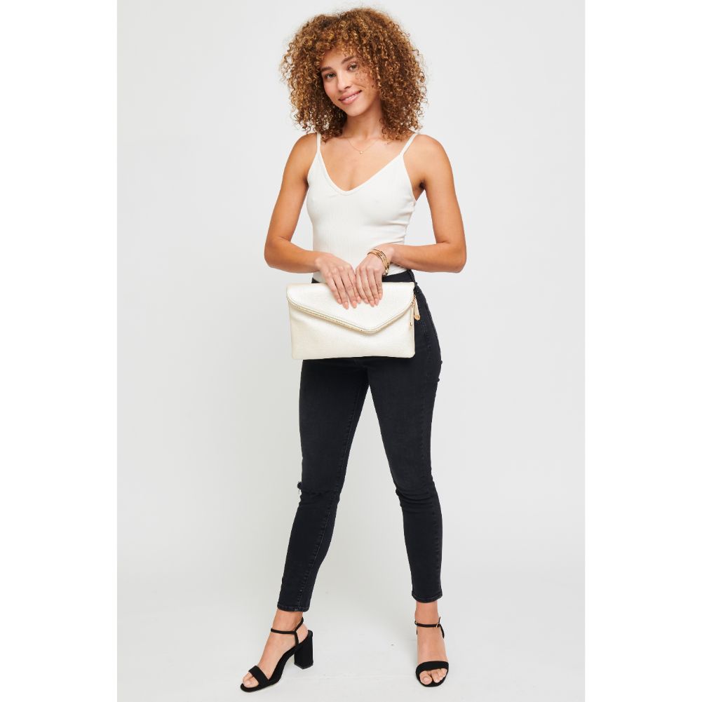 Woman wearing Pearl Gold Urban Expressions Stella Clutch 840611151575 View 3 | Pearl Gold