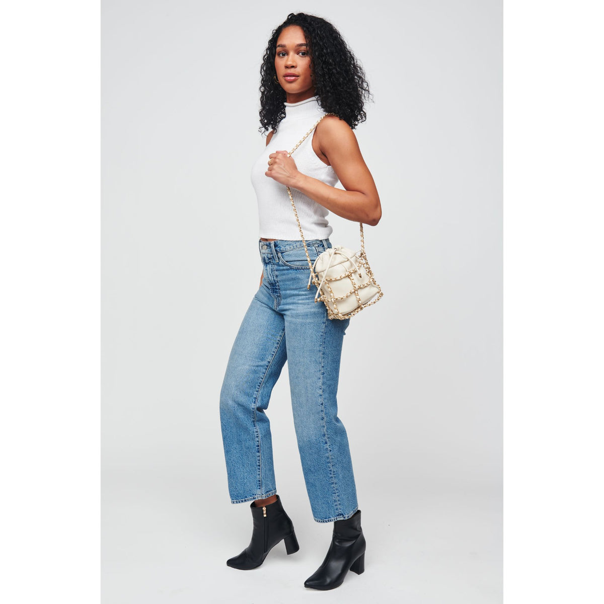 Woman wearing Oatmilk Urban Expressions Moira Crossbody 818209012348 View 4 | Oatmilk