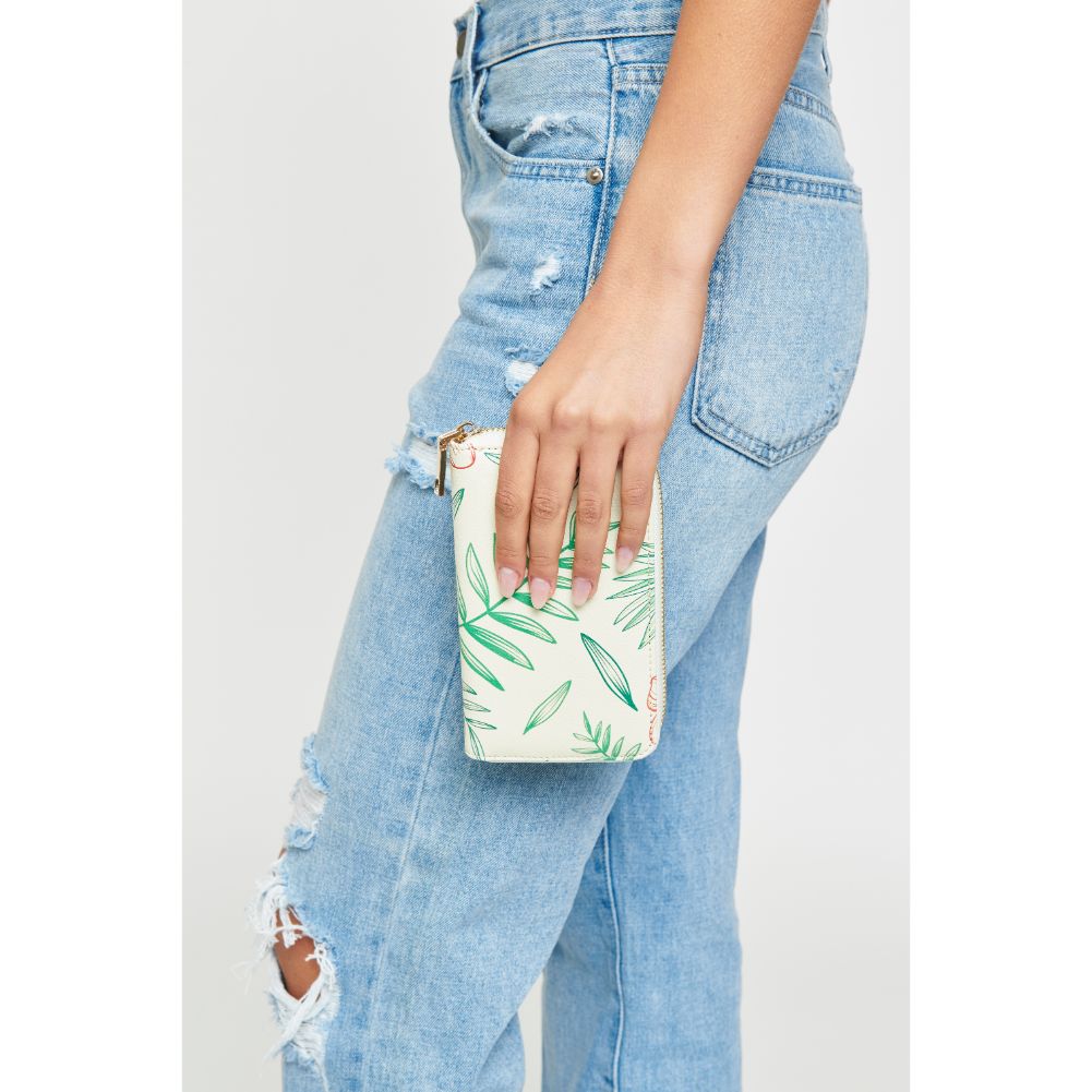 Woman wearing Ivory Multi Urban Expressions Hula Wallet 840611145277 View 3 | Ivory Multi
