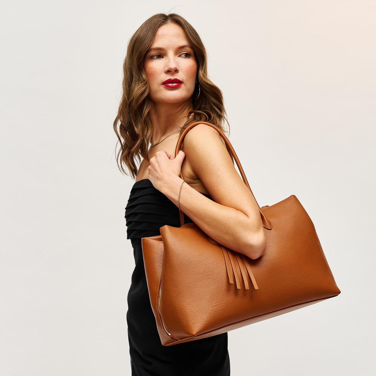 Woman wearing Tan Urban Expressions Sadie Satchel 840504205323 View 1 | Tan