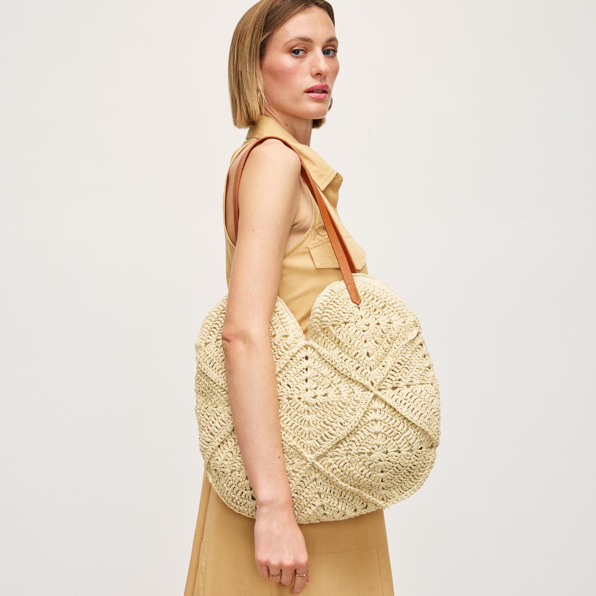 Woman wearing Ivory Urban Expressions Clara Tote 840611157133 View 1 | Ivory