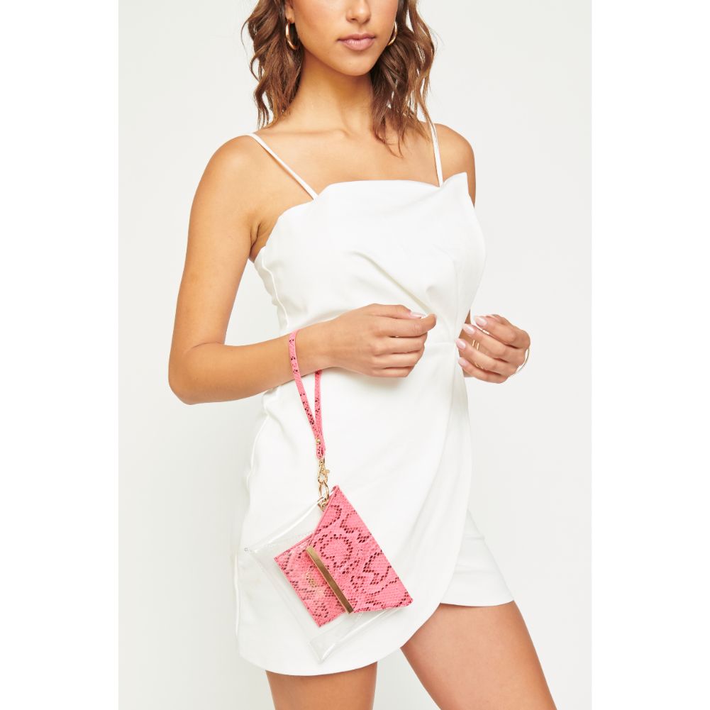 Woman wearing Neon Pink Urban Expressions Reese - Neon Snake Wristlet 840611163462 View 1 | Neon Pink