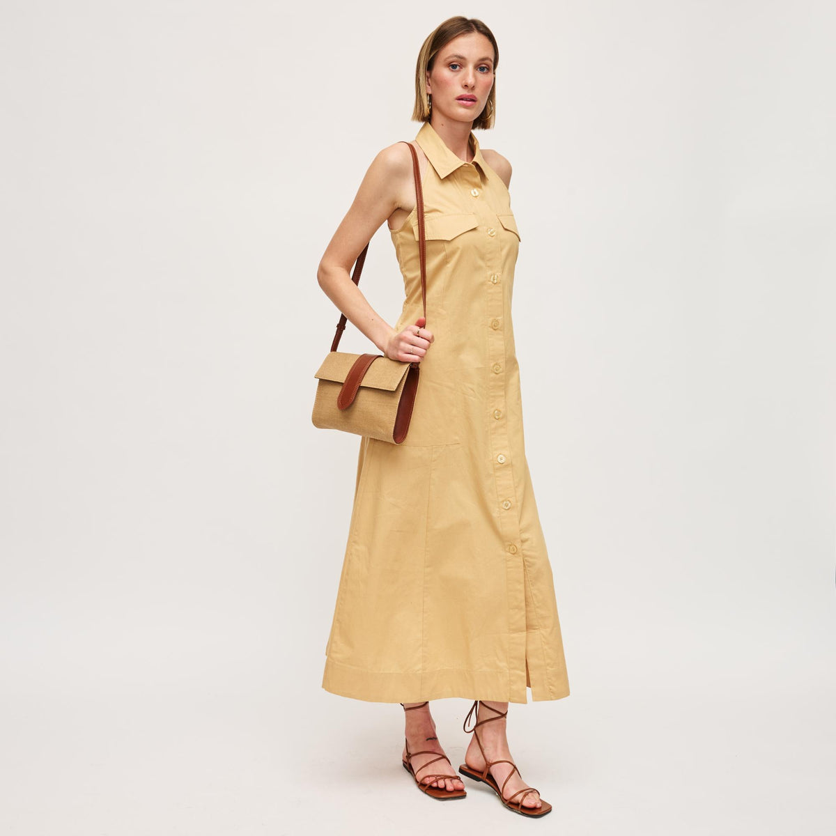 Woman wearing Natural Tan Urban Expressions Sia Crossbody 840611151773 View 2 | Natural Tan