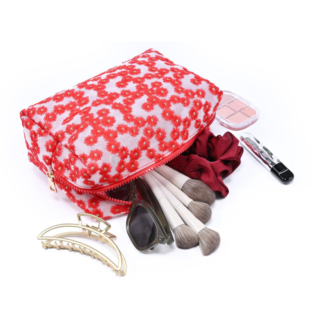 Woman wearing Red Urban Essentials Daisy Chain Cosmetic & Travel Organizer Pouch 840504207488 View 1 | Red