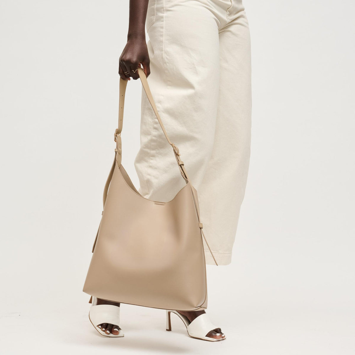 Woman wearing Almond Urban Expressions Maria Hobo 840504206276 View 2 | Almond