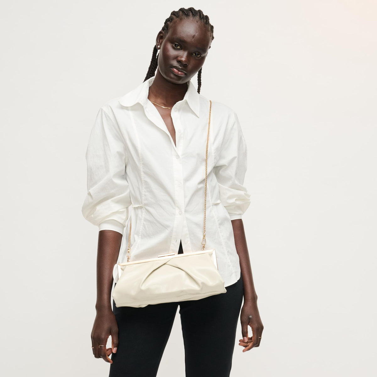 Woman wearing Bone Urban Expressions Scottie Crossbody 840504207976 View 2 | Bone
