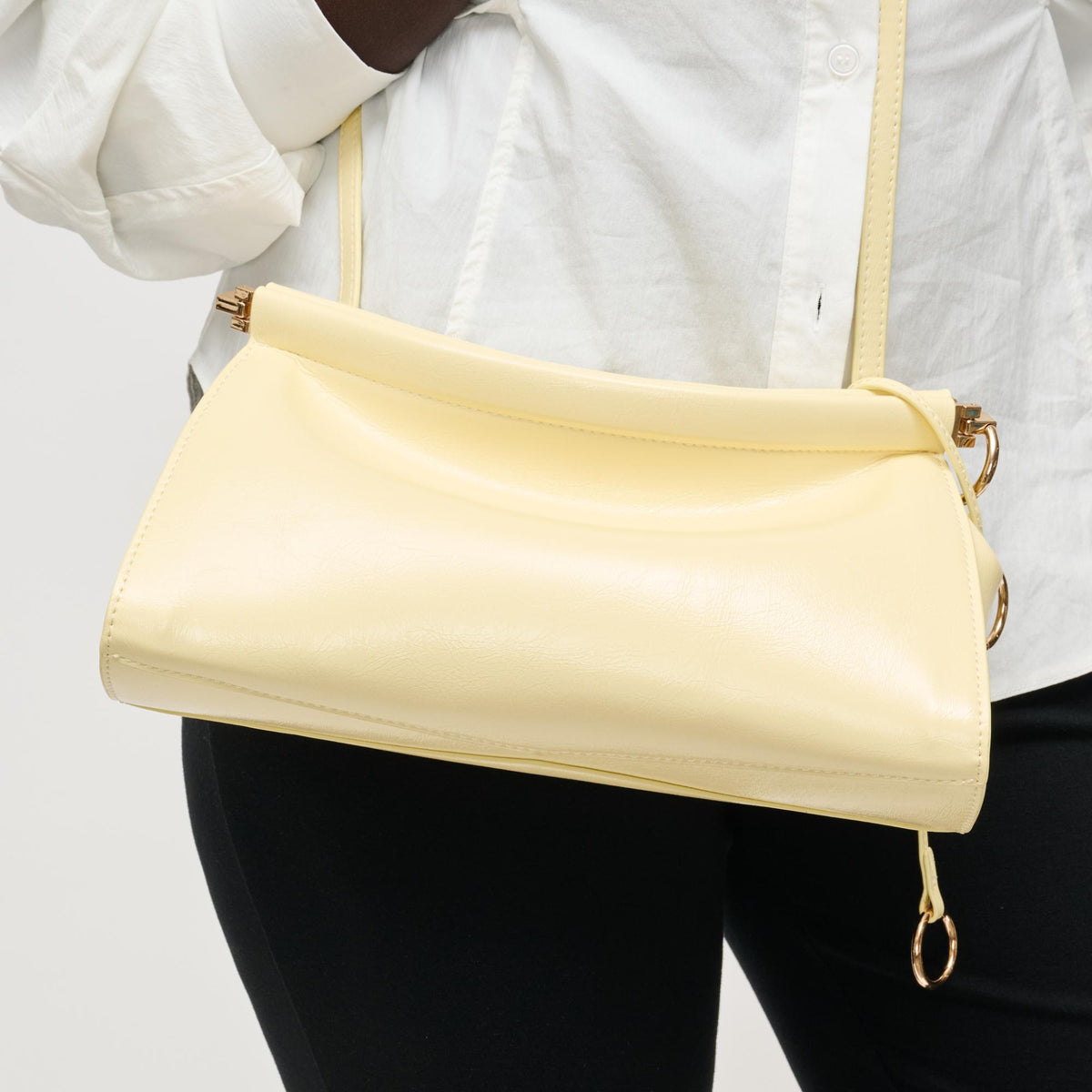 Woman wearing Butter Urban Expressions Elowyn Crossbody 840504208034 View 1 | Butter