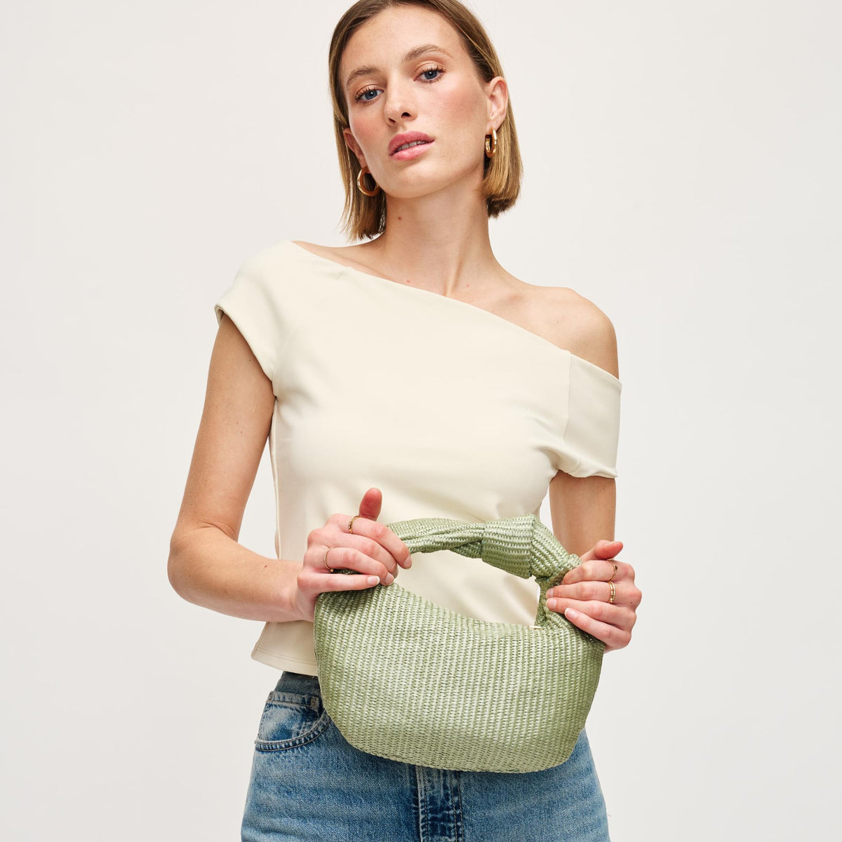 Woman wearing Sage Urban Expressions Tracy - Stripes Clutch 840611141682 View 2 | Sage