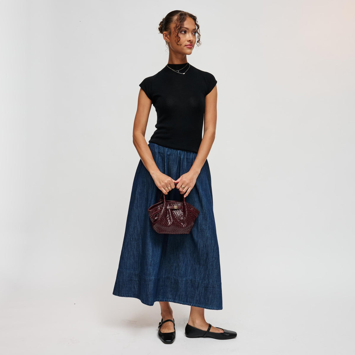 Woman wearing Burgundy Urban Expressions Selena - Embossed Woven Crossbody 840504212147 View 4 | Burgundy