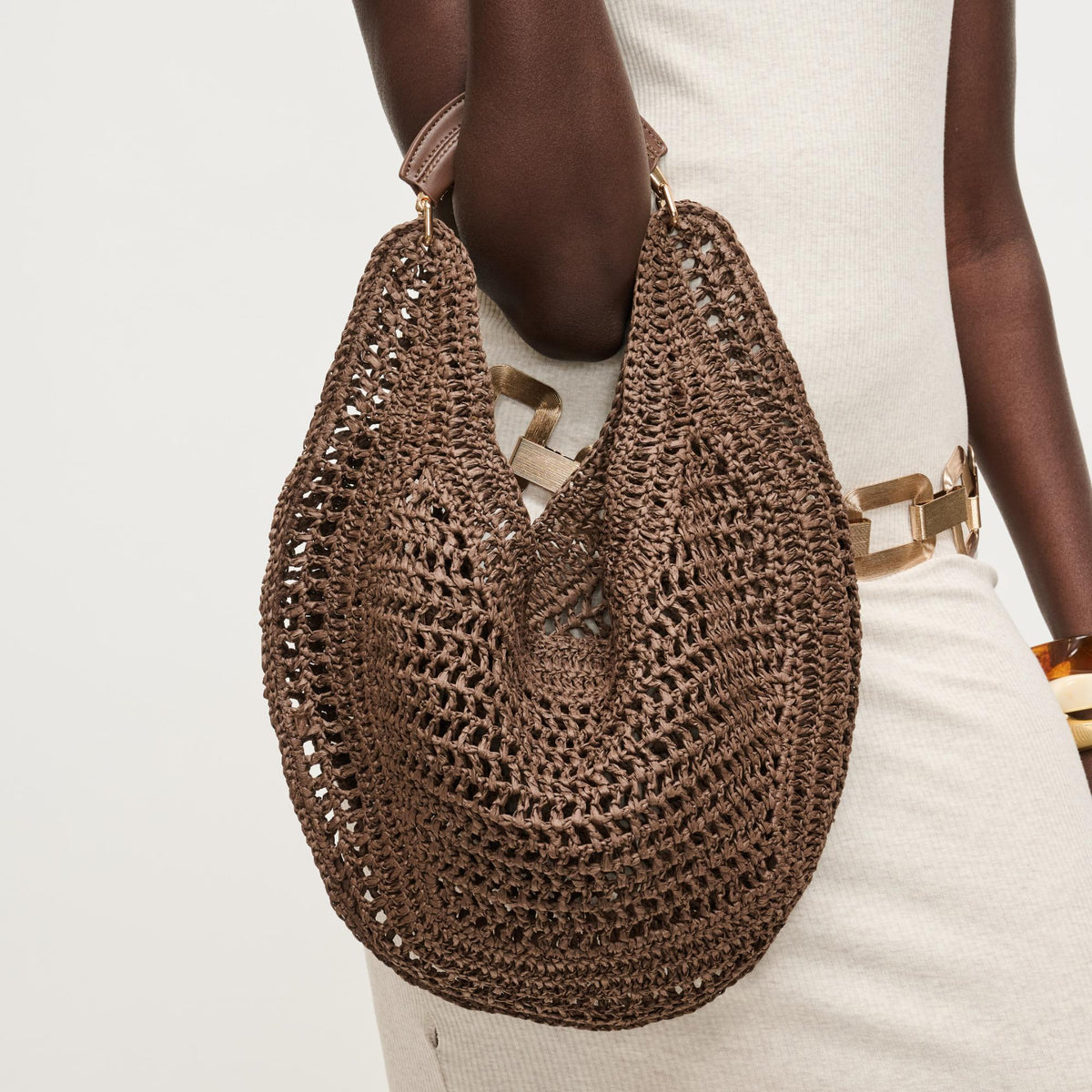 Woman wearing Chocolate Urban Expressions Camden Hobo 840504202995 View 3 | Chocolate
