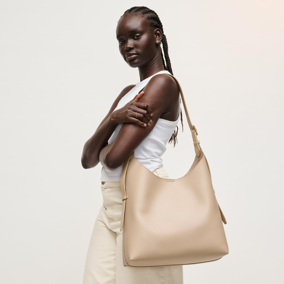 Woman wearing Almond Urban Expressions Maria Hobo 840504206276 View 1 | Almond
