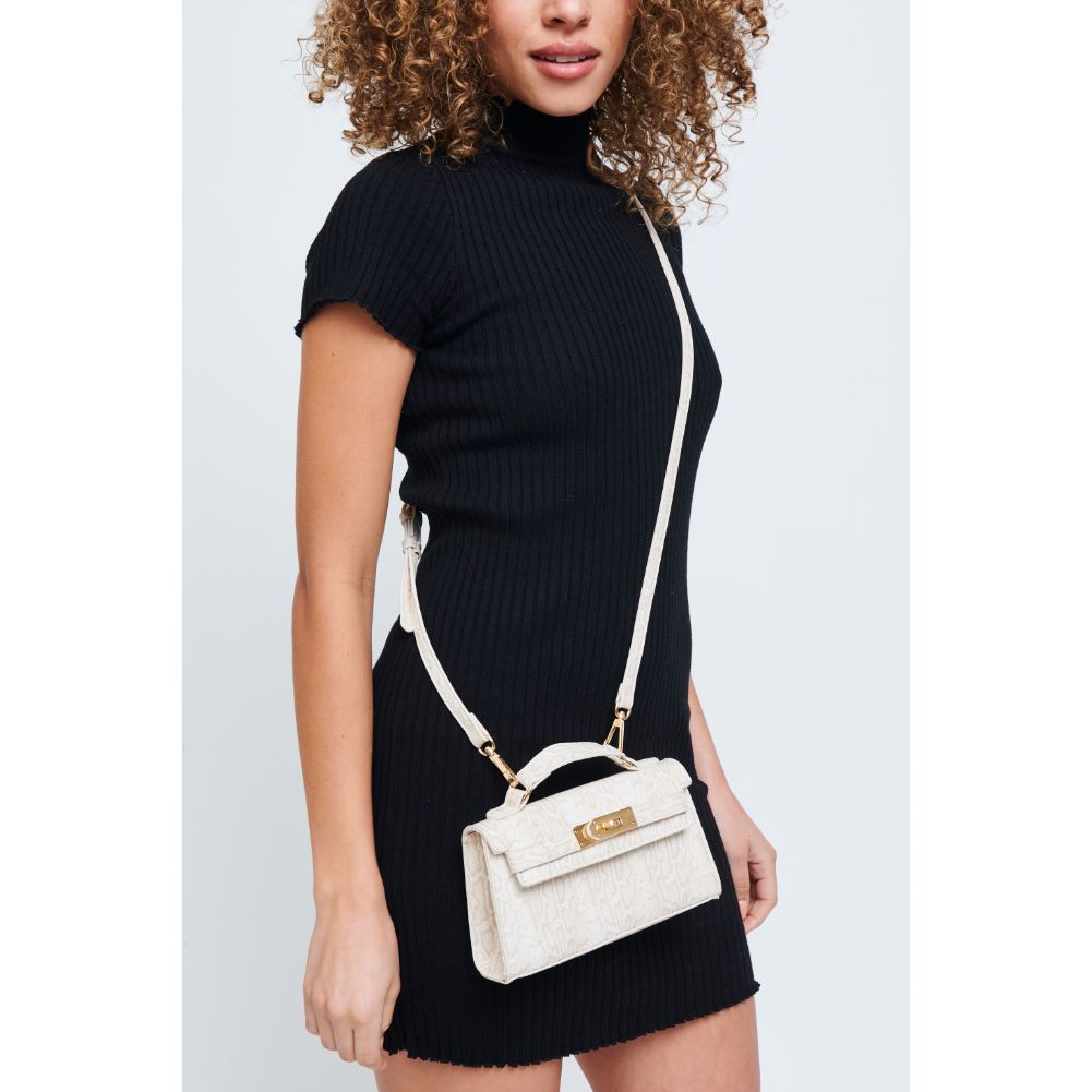 Woman wearing Cream Urban Expressions Georgina Snake Crossbody 840611171962 View 1 | Cream