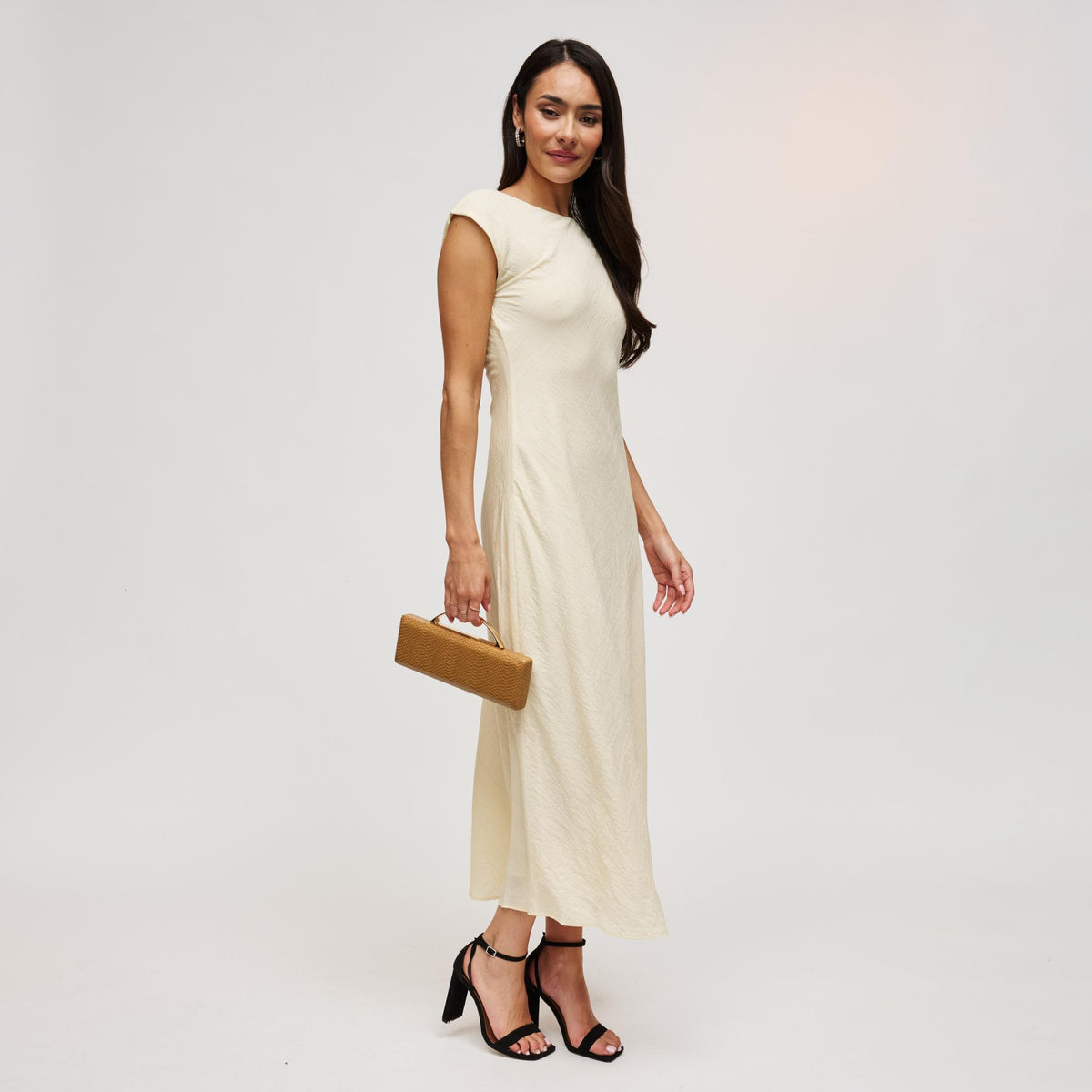Woman wearing Mustard Urban Expressions Banks Clutch 840504212079 View 4 | Mustard