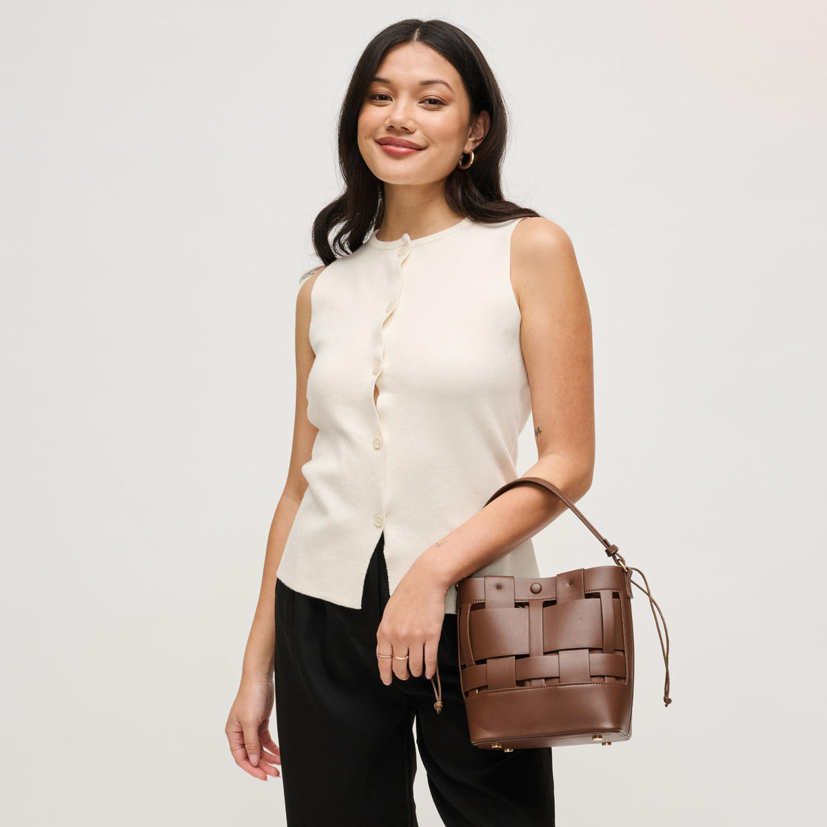 Woman wearing Chocolate Urban Expressions Parker Crossbody 840504205453 View 2 | Chocolate