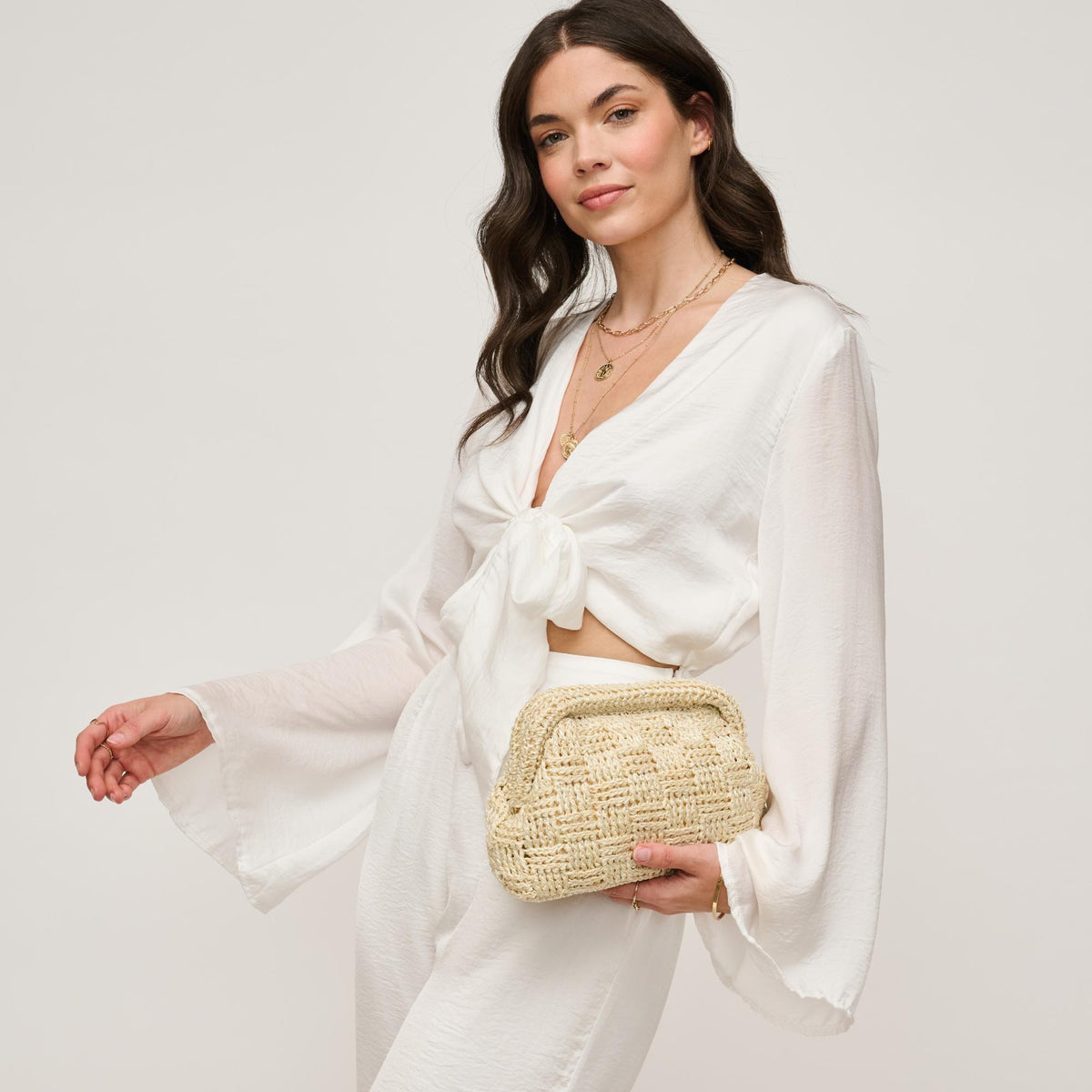 Woman wearing Cream Urban Expressions Annie Clutch 840611146267 View 1 | Cream