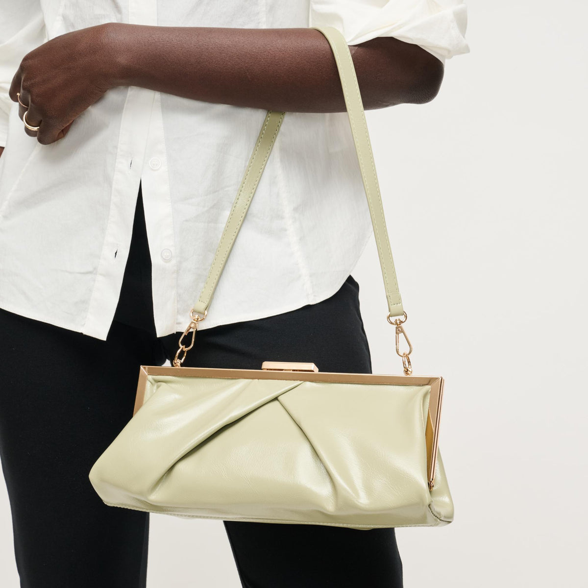Woman wearing Sage Urban Expressions Scottie Crossbody 840504207983 View 1 | Sage