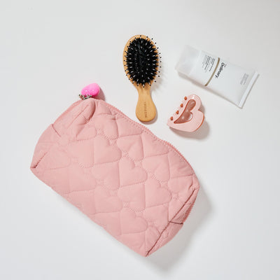 Woman wearing Rose Urban Essentials Pull My Heart Cosmetic & Travel Organizer Pouch 840611196989 View 1 | Rose